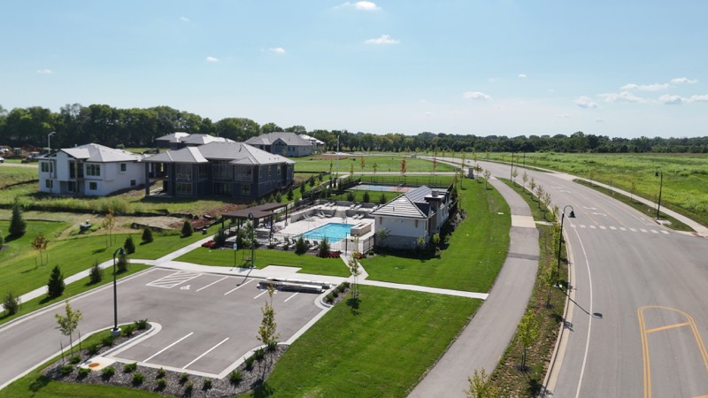 Aerial view of the community pool and pickleball court